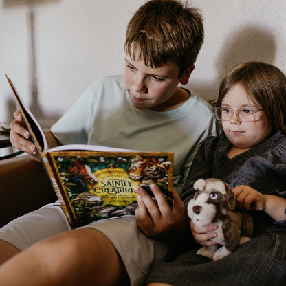https://cdn.shopify.com/s/files/1/0005/3195/5769/files/SaintlyCreaturesKidsReadingLifestyle_6af7ed8e-efad-4429-a4e5-46d749b464b4.jpg?v=1761843293